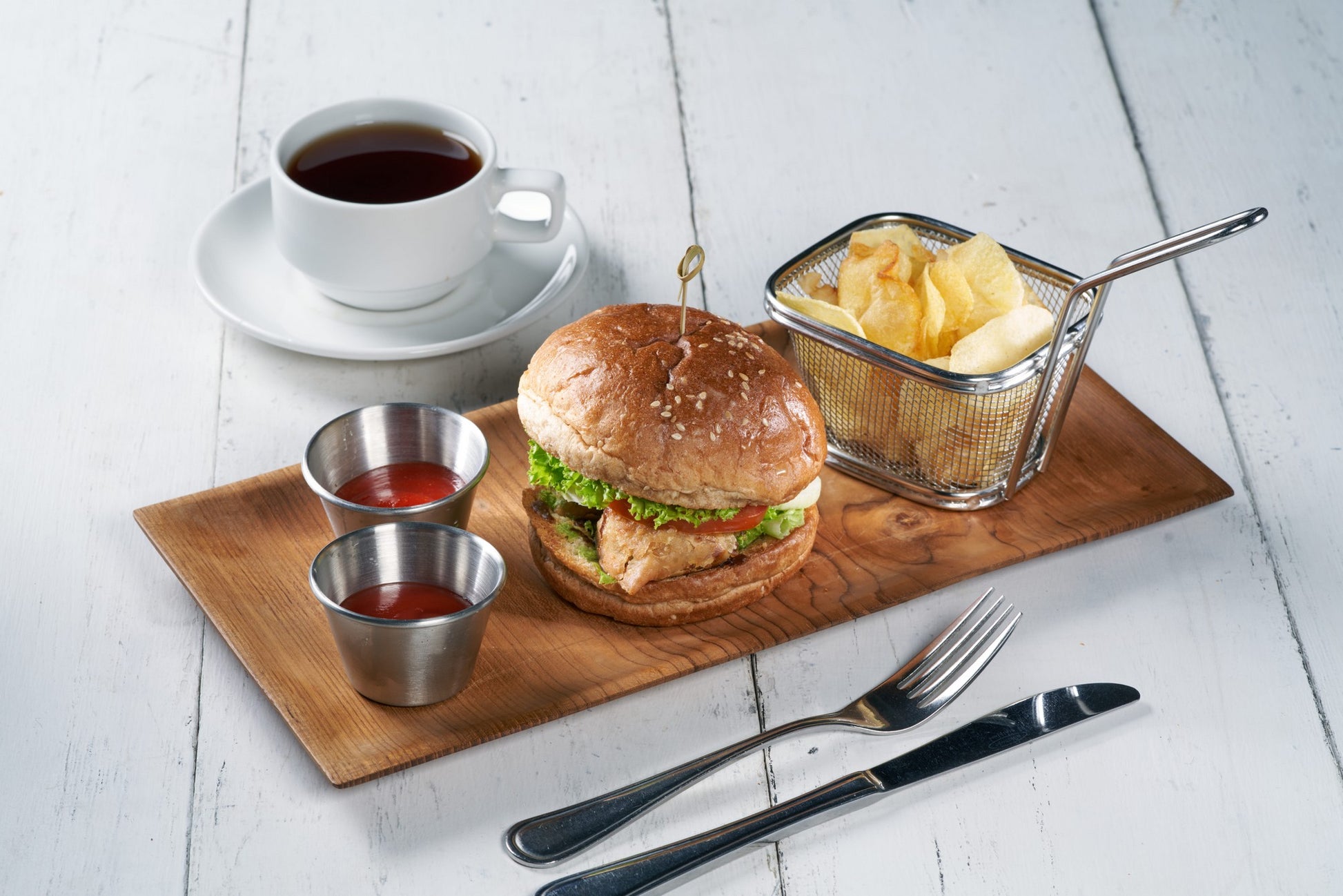A plate of crispy Samosas, a traditional Indian savory pastry filled with potatoes and green peas