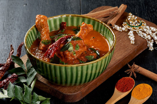 A fiery bowl of Kori Gassi, a Mangalorean chicken curry with a rich coconut milk base