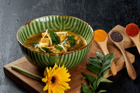 A delectable Malabar Fish Curry, a creamy coconut milk-based curry with aromatic spices and tender fish