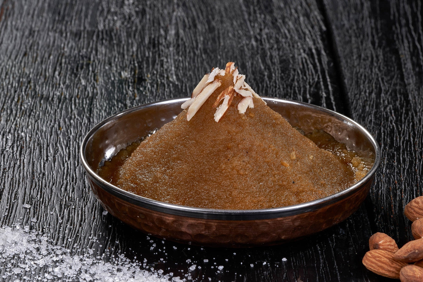 A sweet and nutty Indian pudding, Moong Dal Halwa, made with lentils, cardamom, and sugar
