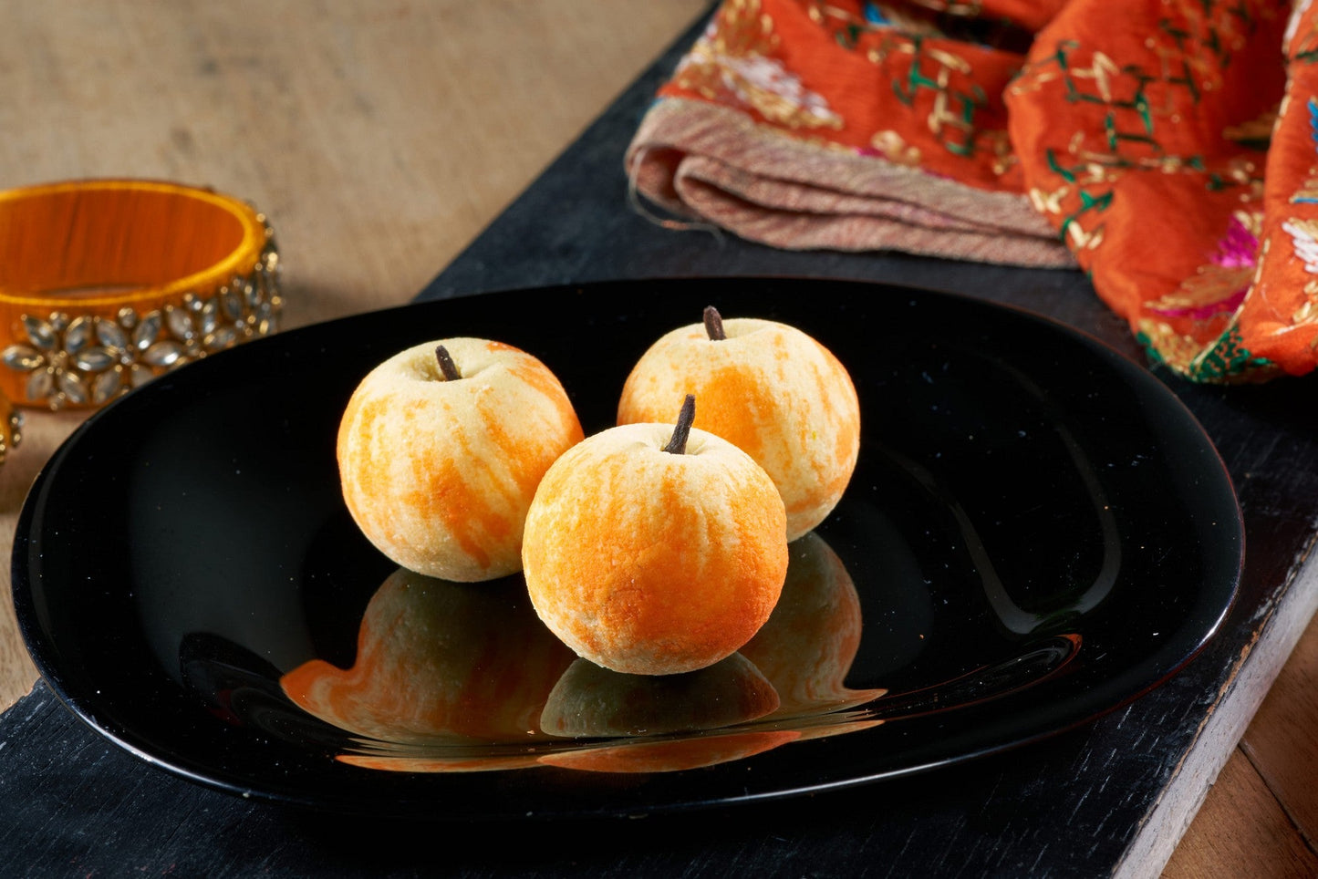 A delightful Indian dessert, Badam Apple, made with sliced apples, soaked in a creamy almond milk sauce