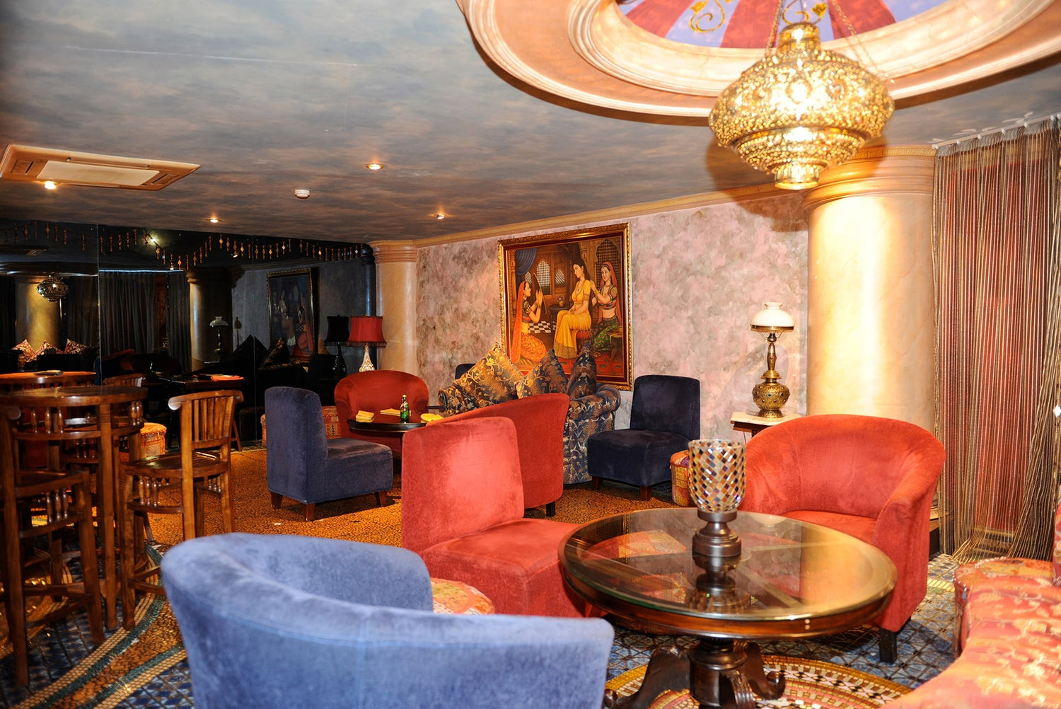 A vibrant dining room with colorful décor at Ganesha Ek Sanskriti, an authentic Indian Restaurant in Ganesha Kemang, Jakarta.