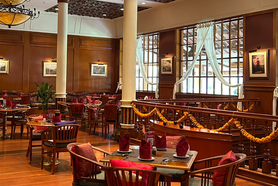 A modern and stylish Indian restaurant interior with elegant seating and a warm ambiance at Ganesha Ayodya Nusa Dua (Bali)