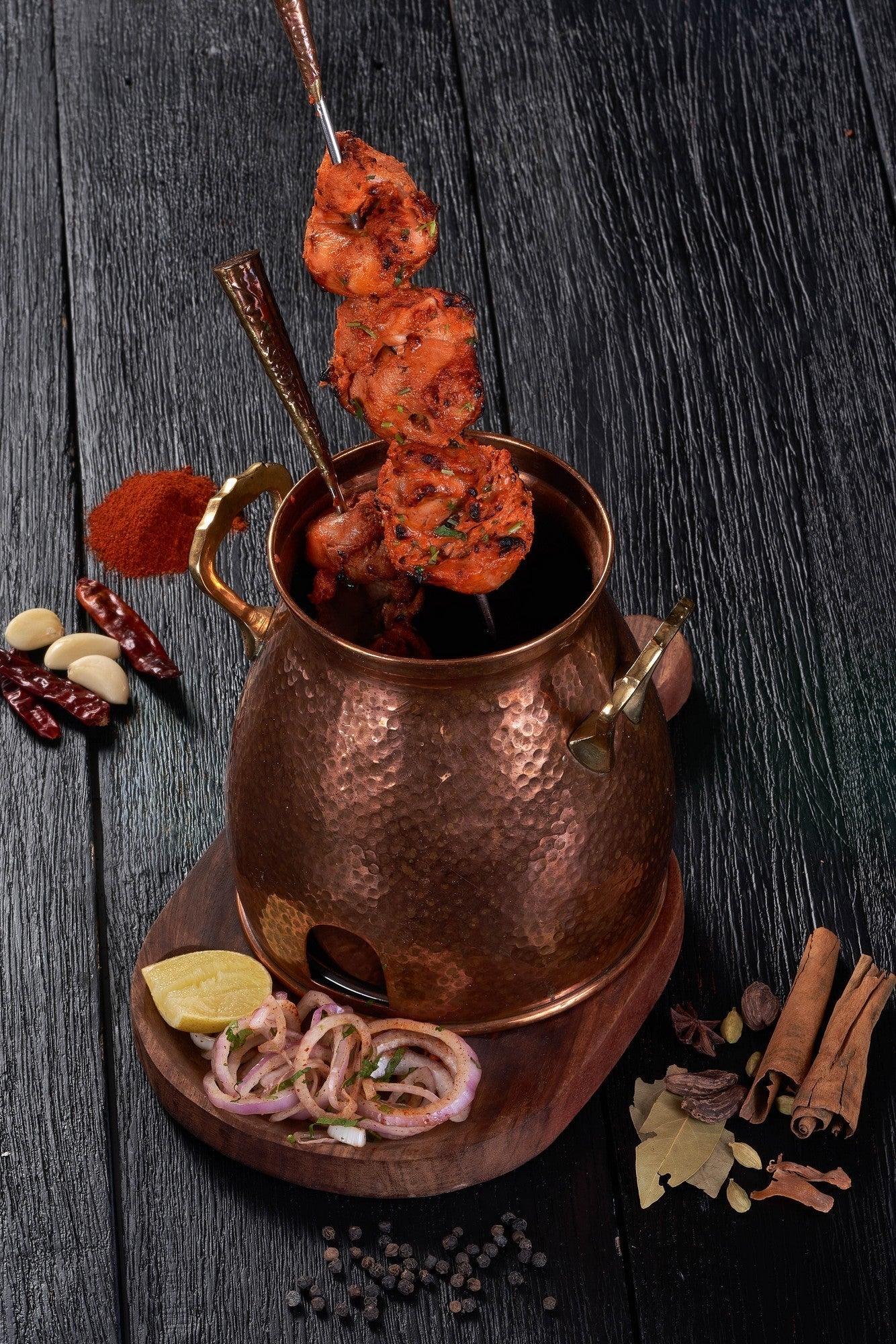 Tender pieces of Chicken Tikka marinated in yogurt and spices at an Indian Restaurant