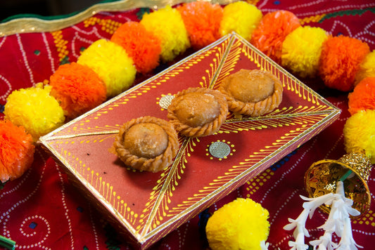 Sweet and syrupy Indian doughnuts, Balushahi, made with flour, ghee, and sugar, soaked in a fragrant syrup